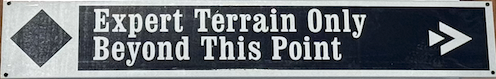 A black and white sign with white text
AI-generated content may be incorrect.